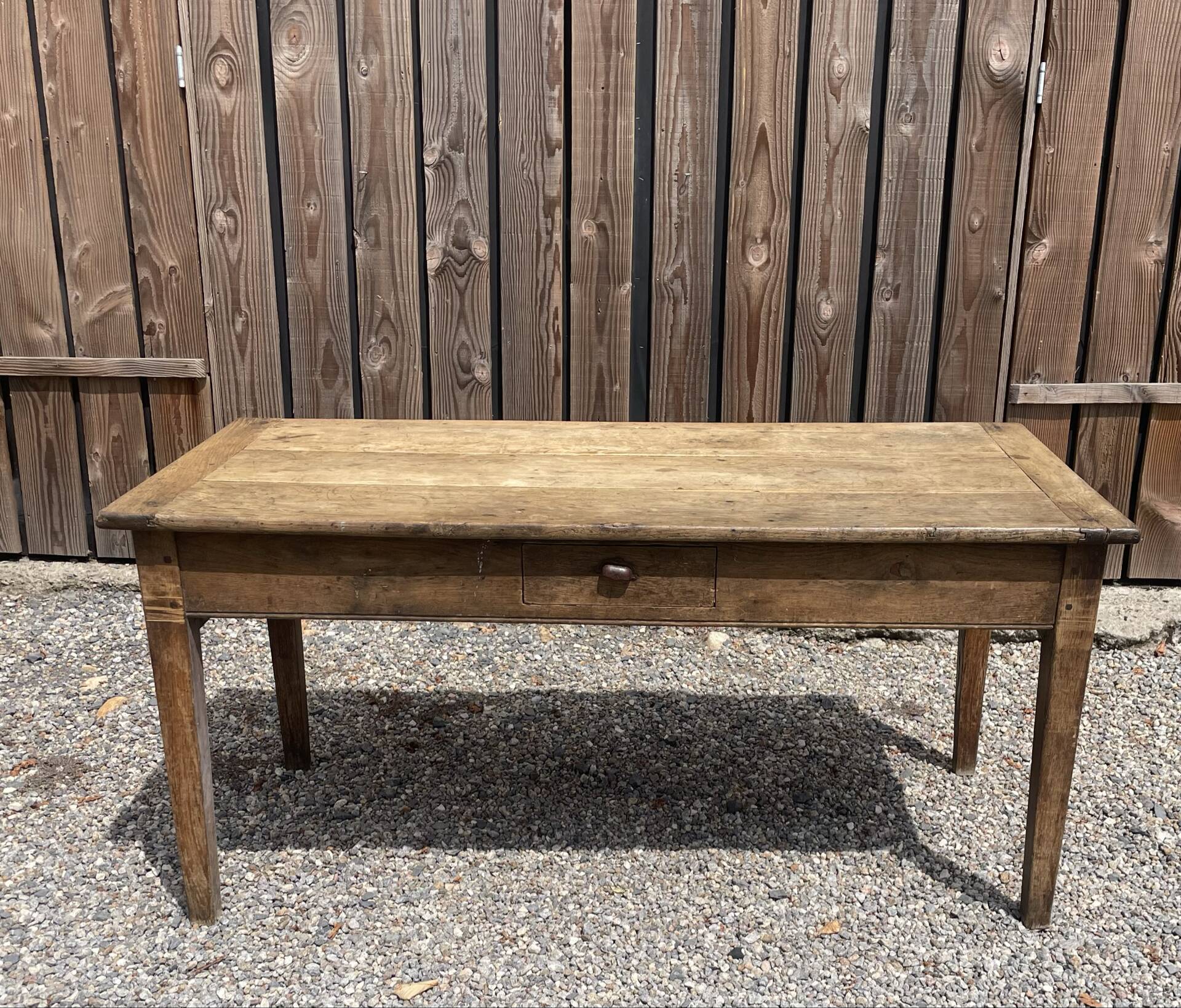 Solid oak farmhouse table with 2 drawers.