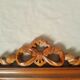 Wooden hanging mirror with vintage carved knot
