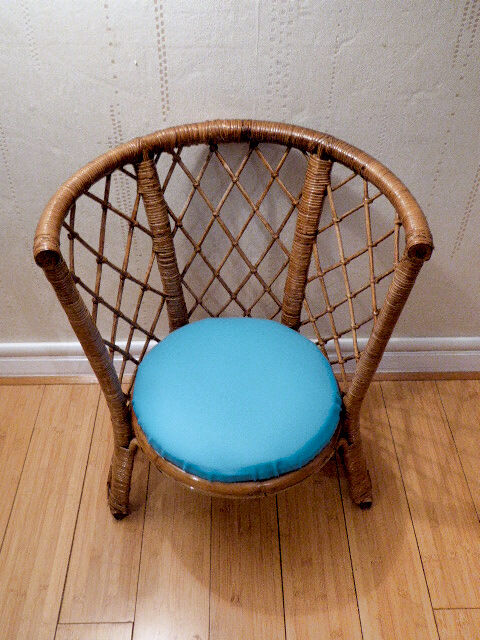 Vintage gold rattan armchair