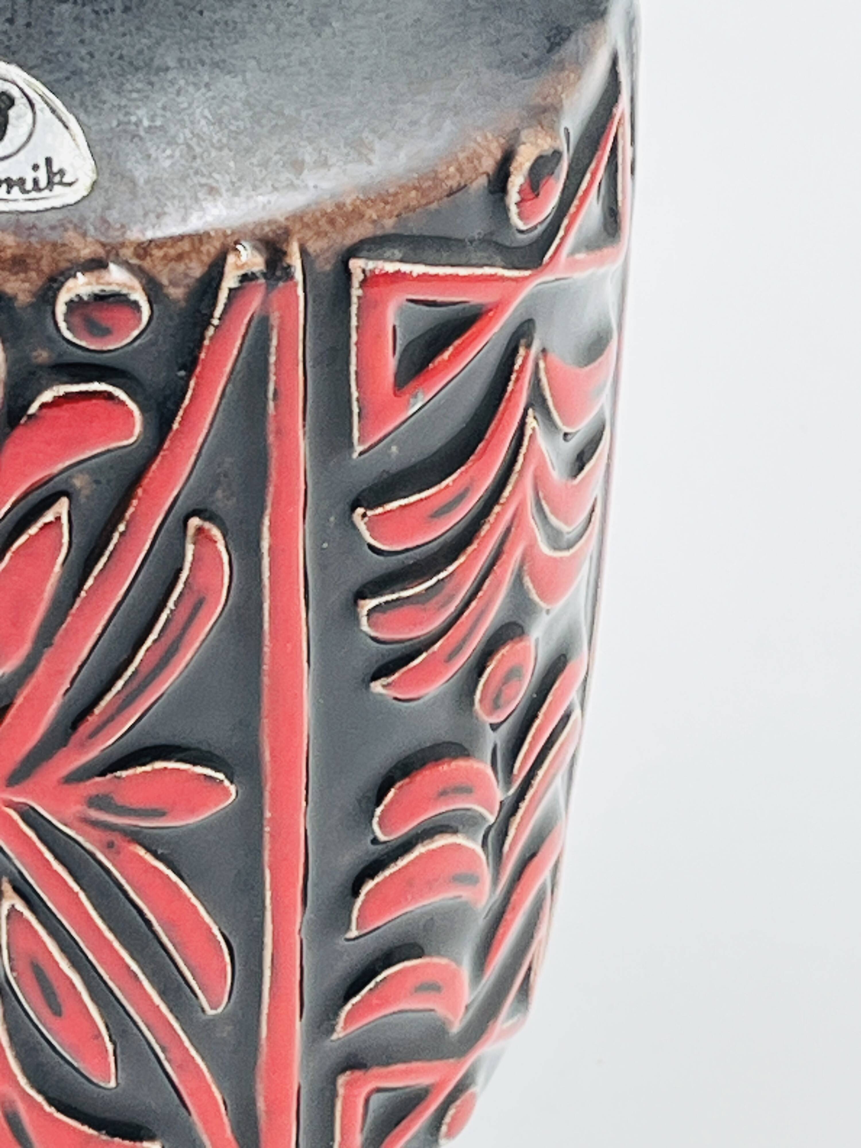 Vase West Germany, ceramic relief, red, 1970s.