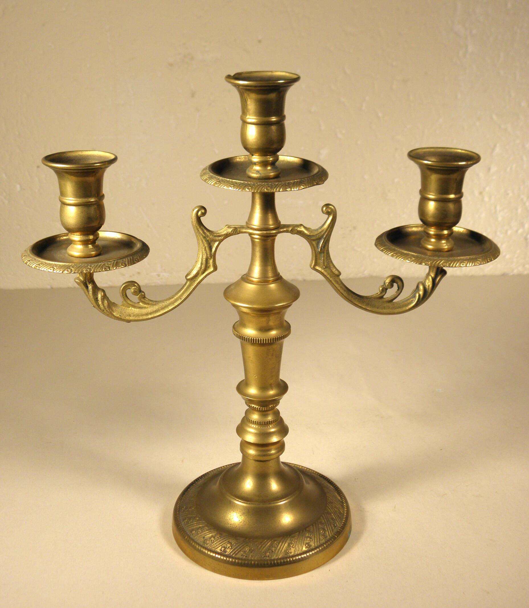 Three-light candlestick in gilded bronze