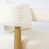 Pair of “bean” shaped armchairs, in blond beech. Contemporary work.
