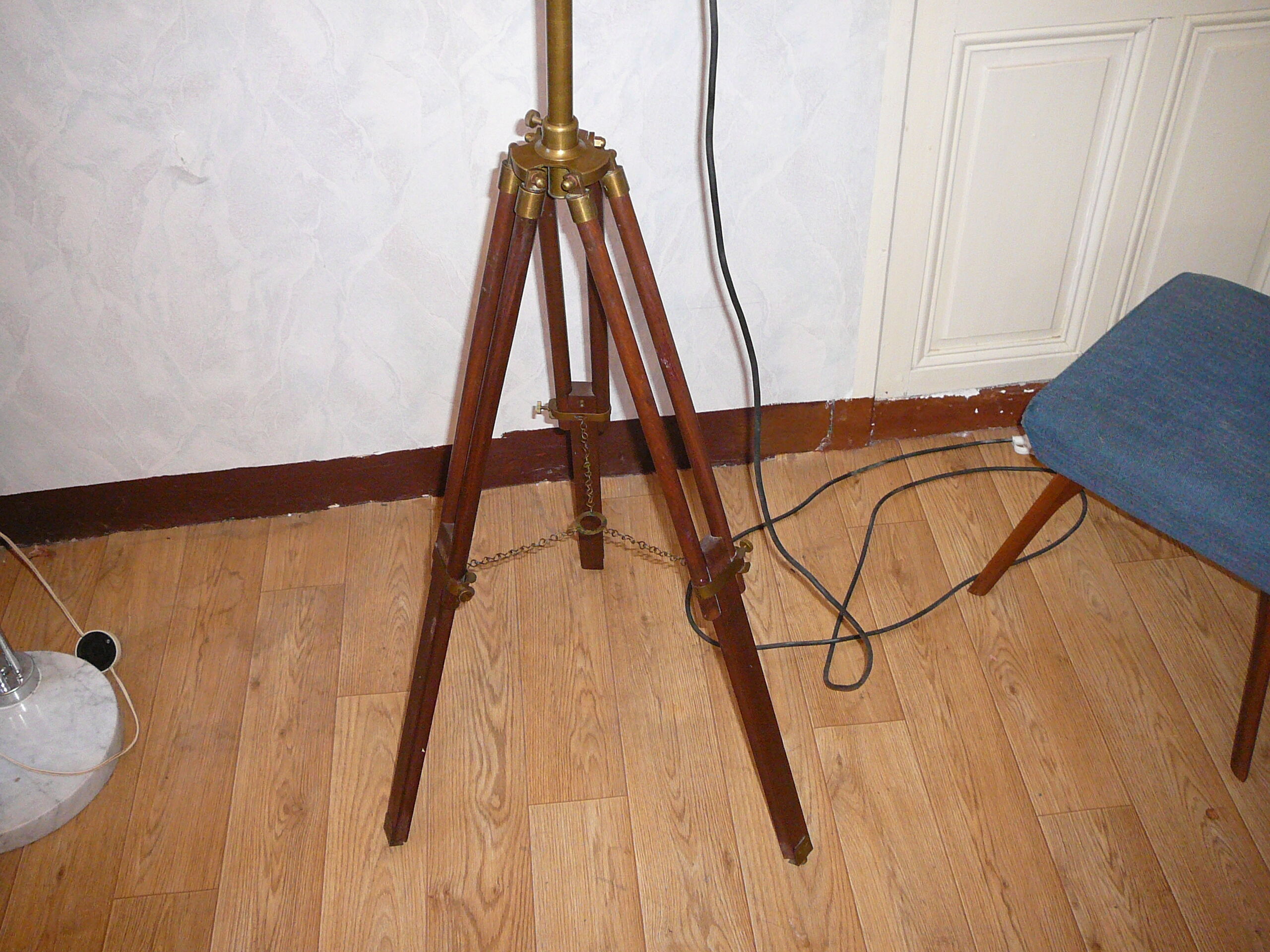 Ancient wooden tripod and brass with its indus lamp