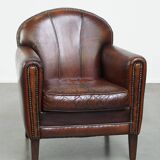 Characterful vintage design armchair made from beautifully patinated sheepskin