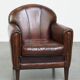 A vintage-style armchair with character, upholstered in beautifully patinated sheepskin.