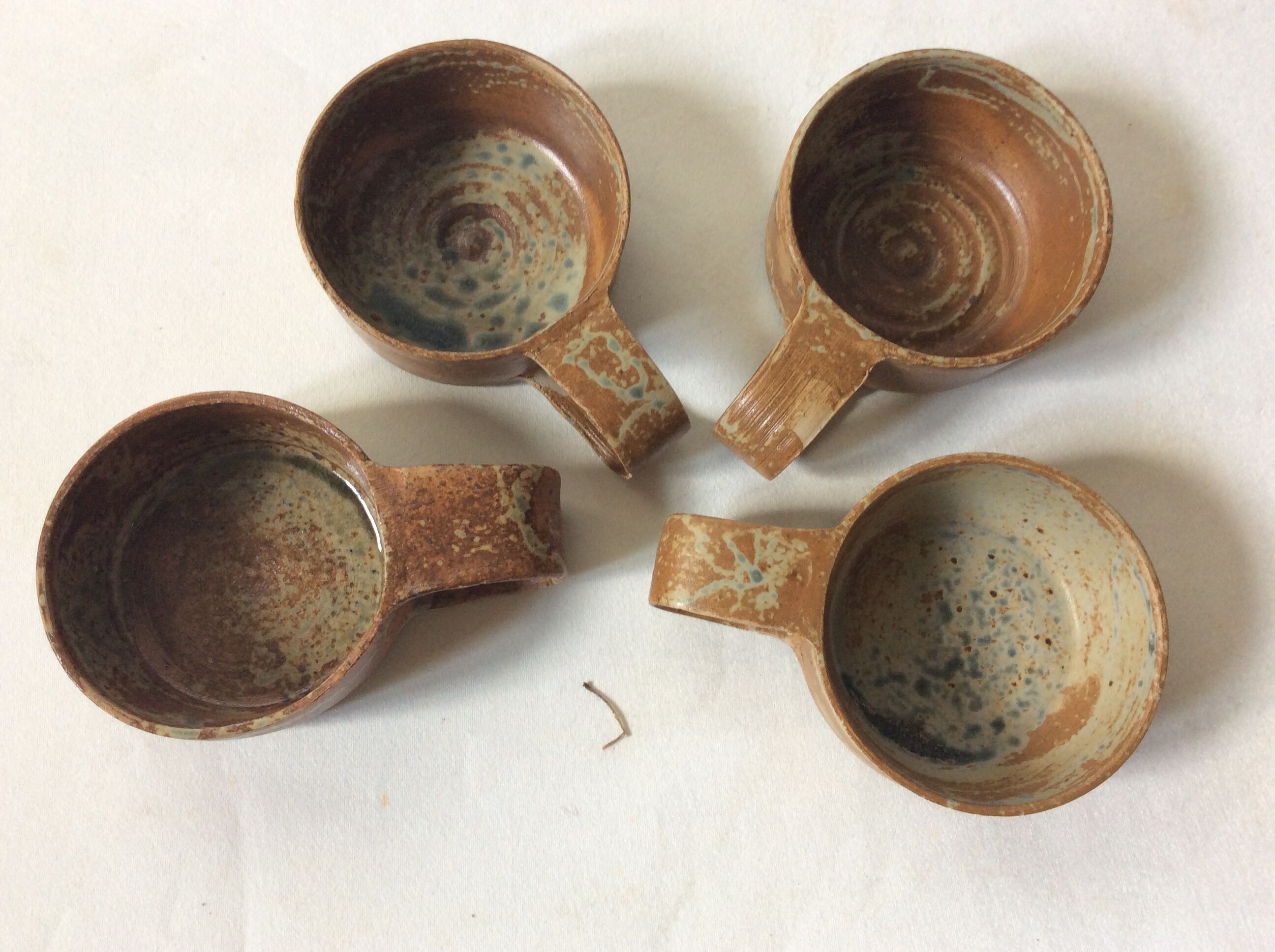 Raw sandstone cups
