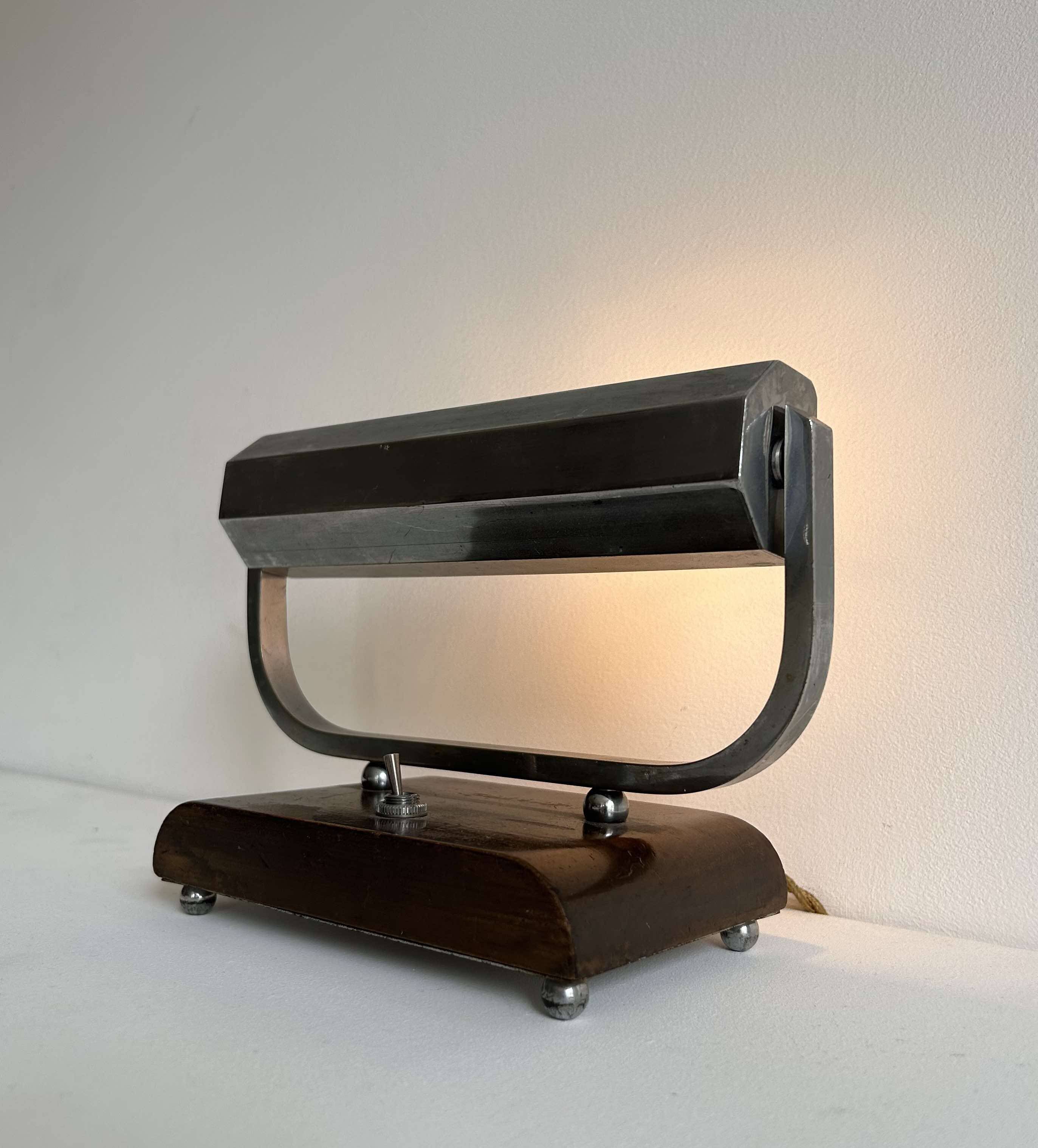 Modernist art deco desk lamp, chromed metal and wood, France 1930