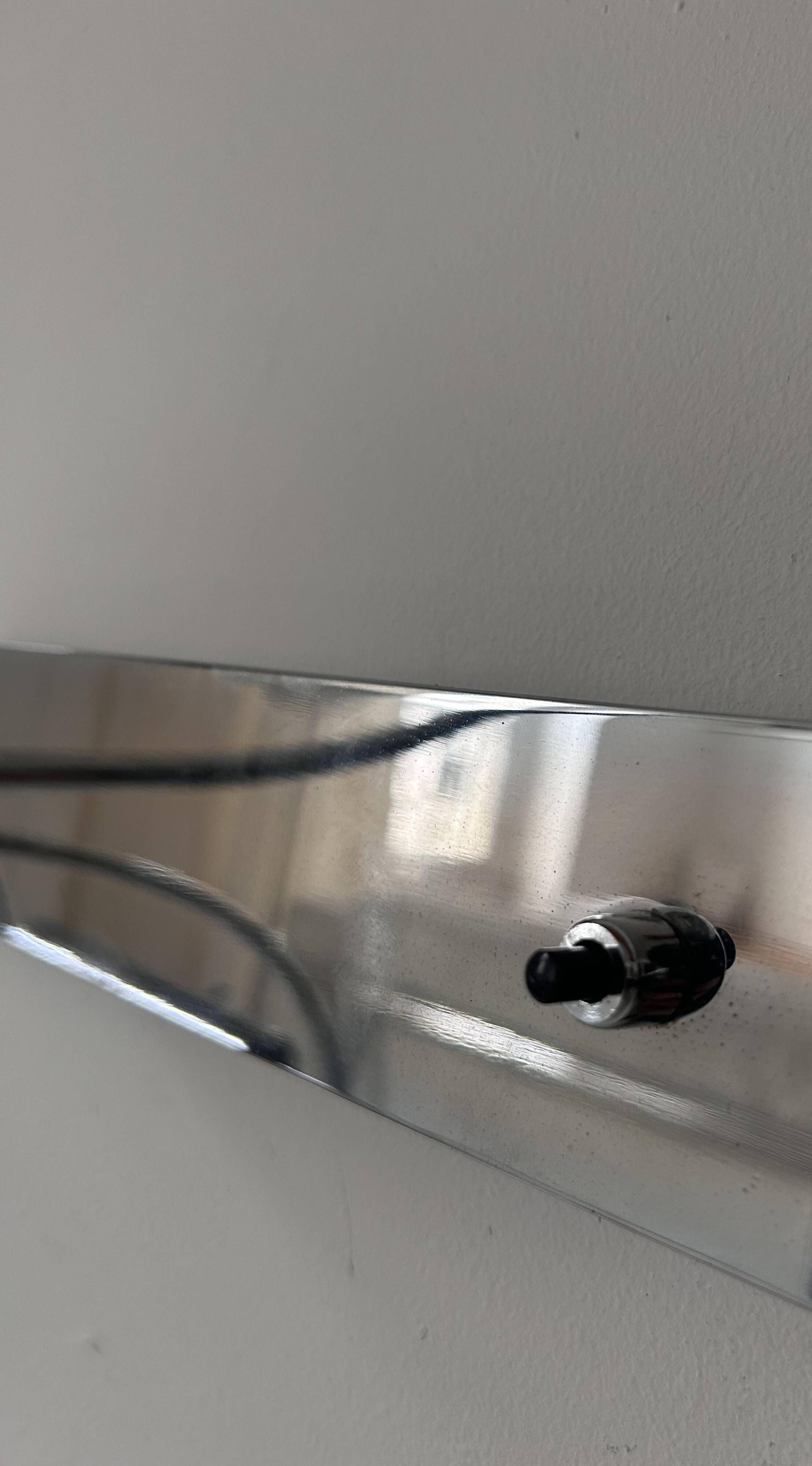 Pair of vintage adjustable wall lights, chrome metal, France 1970.