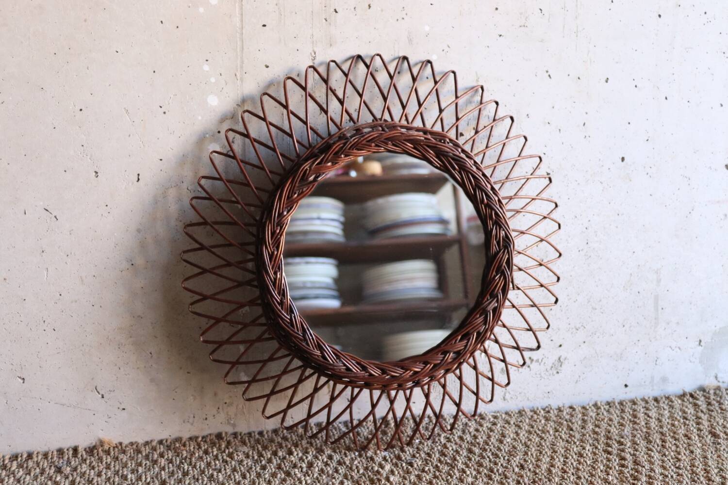 Vintage rattan sun mirror
