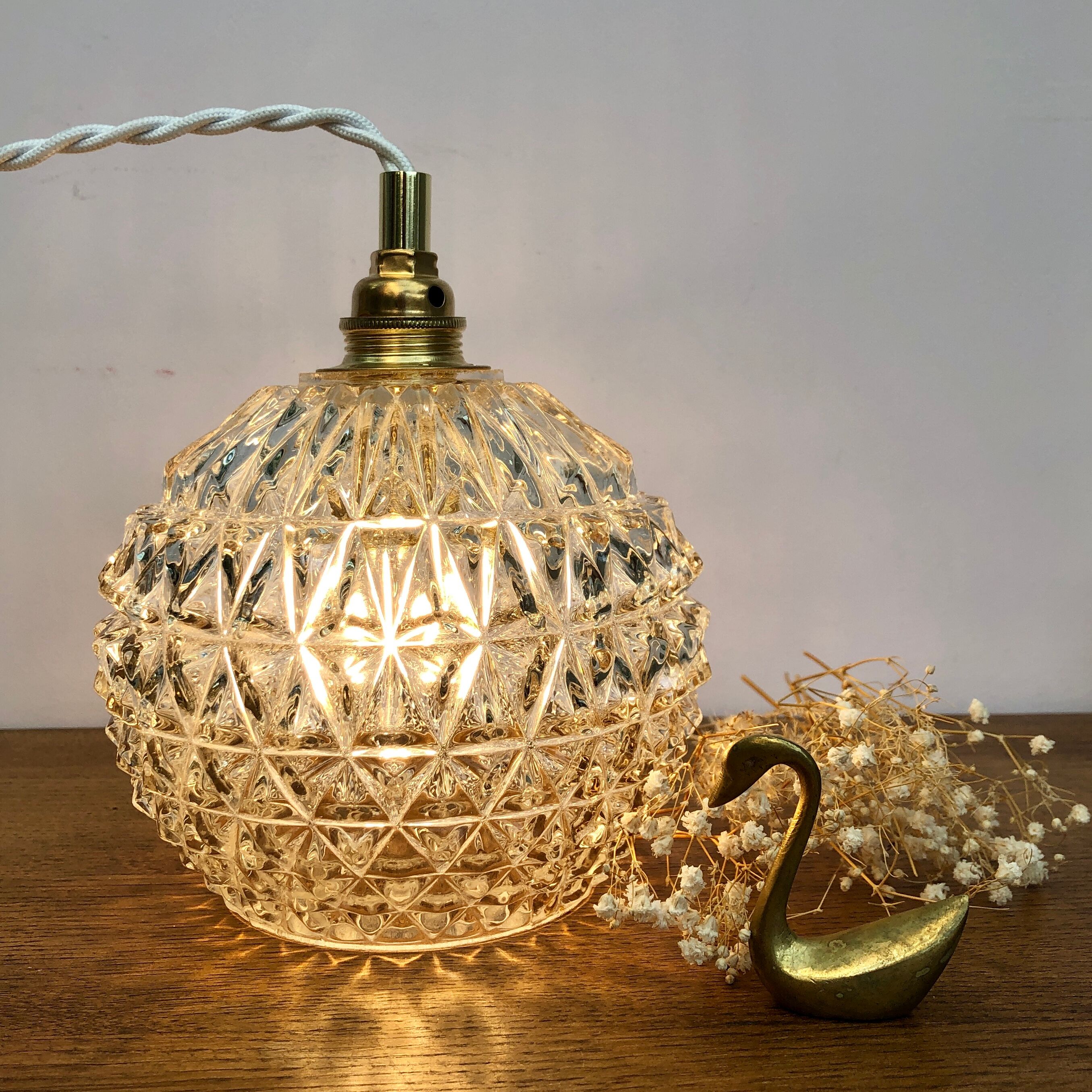 Vintage globe stroller in moulded glass