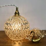 Vintage globe stroller in moulded glass