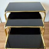 Vintage 1970 gold metal nesting tables.