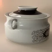 Porcelain soup tureen by Winterling, decorated with brown flowers.