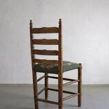 Rustic ladder-back oak chairs with embroidered seats | Netherlands | 1950s