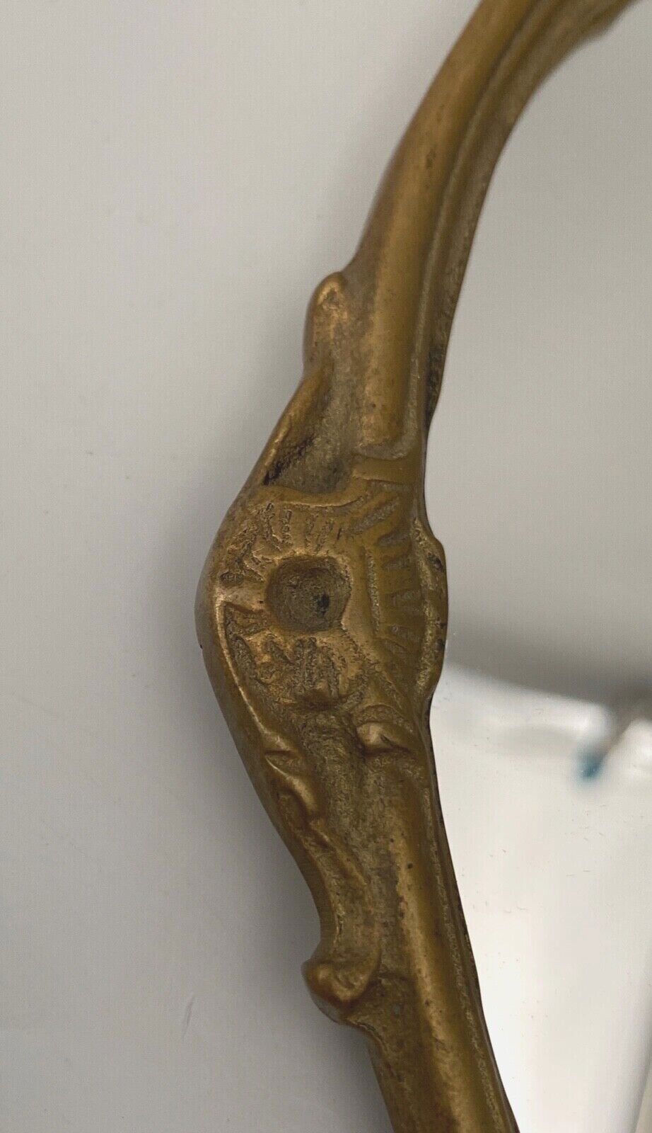 Bronze hand face of the middle XXe decor d'angelot