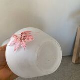 Kitsch vase with floral decoration
