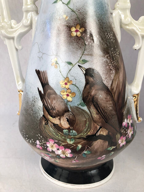 Pair of paris porcelain vases with bird decorations