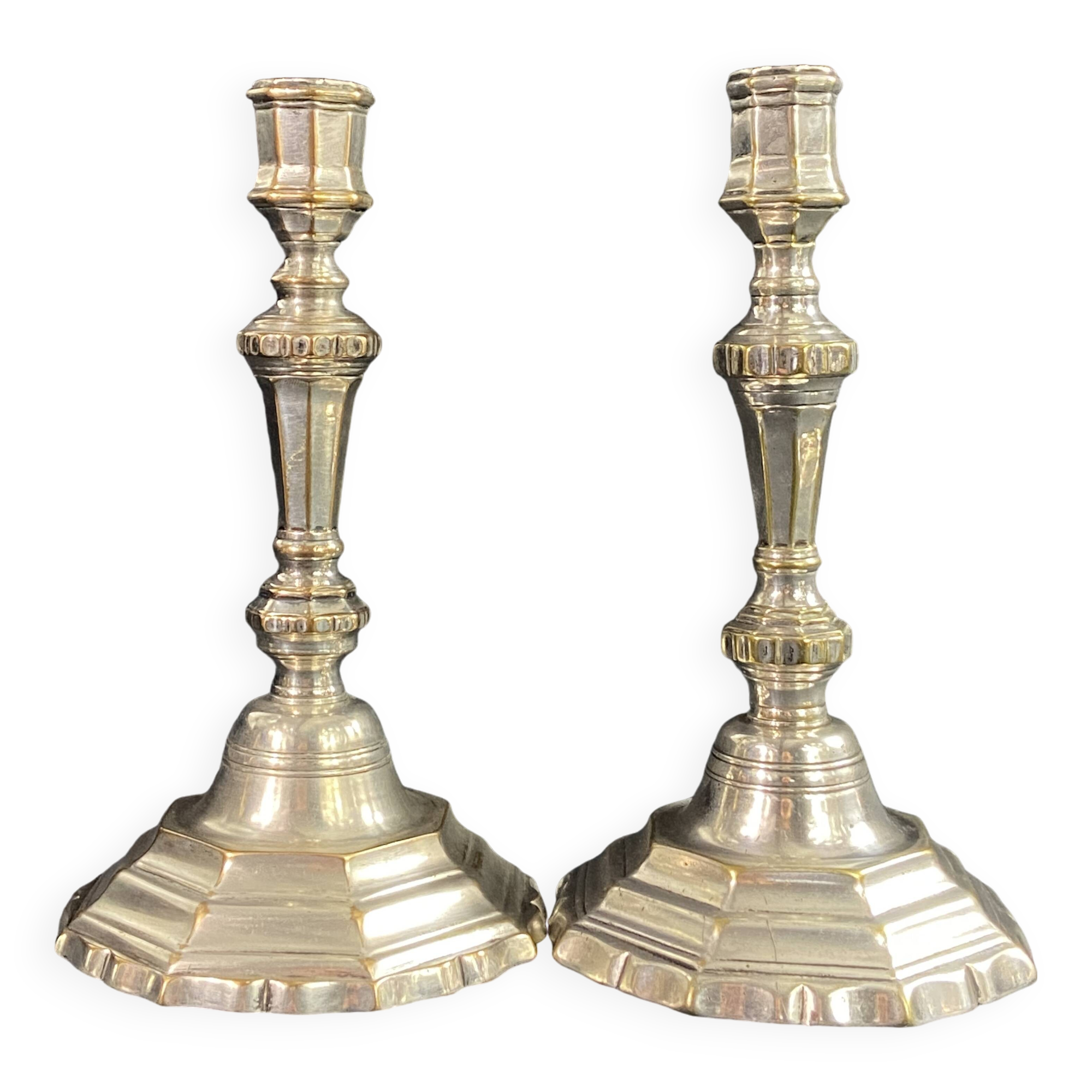 Pair of 18th century Regency candlesticks in silvered bronze