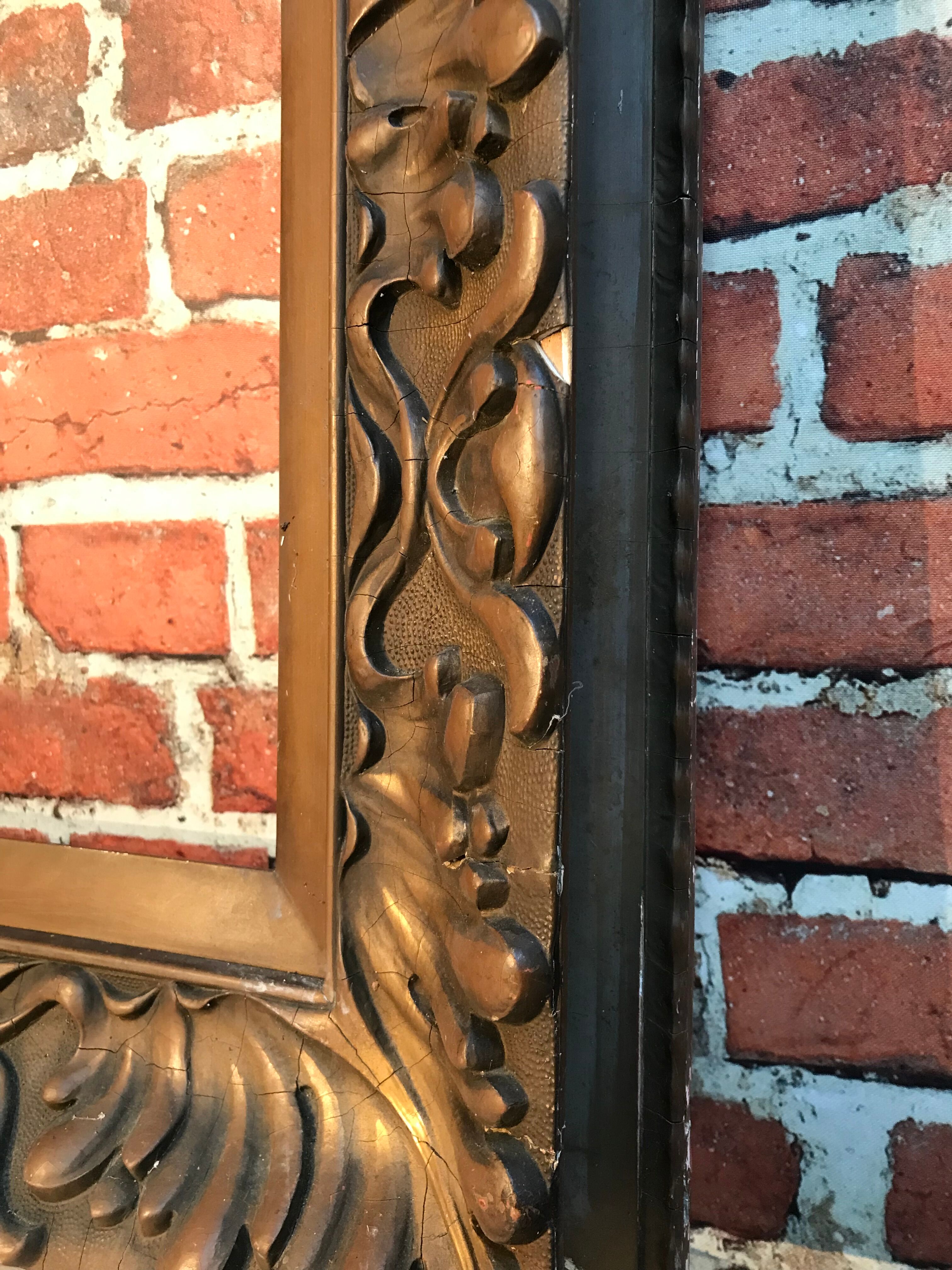 Wooden frame and stucco moldings