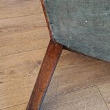 Red voltaire armchair