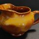 20th century glazed terracotta cream pitcher