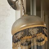 Glass lampshade and pearl tassels