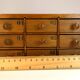 Small drawer unit, vintage wooden watchmaker's chest.