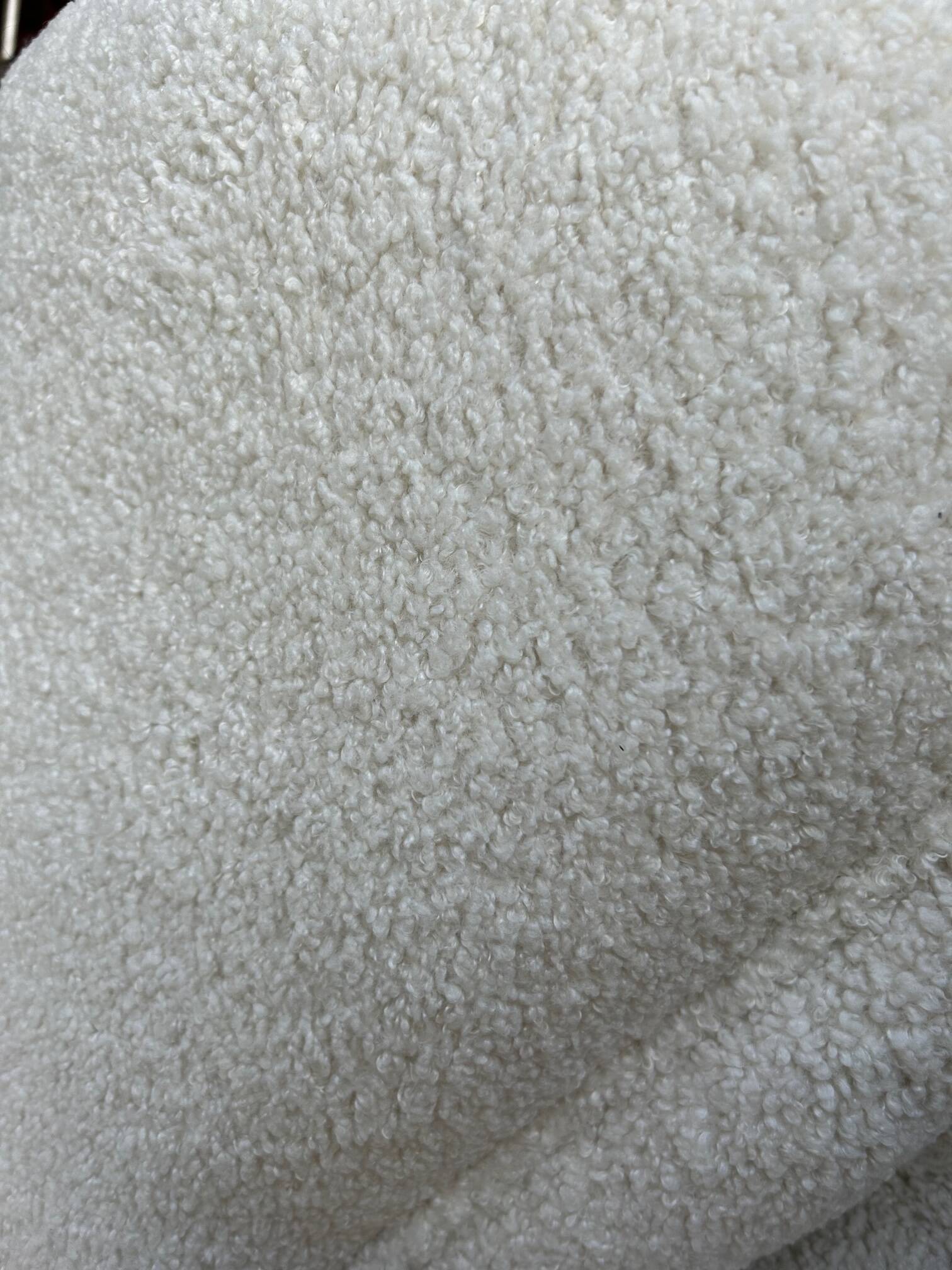 Lounge chair by Märta Blomstedt and matching footstool