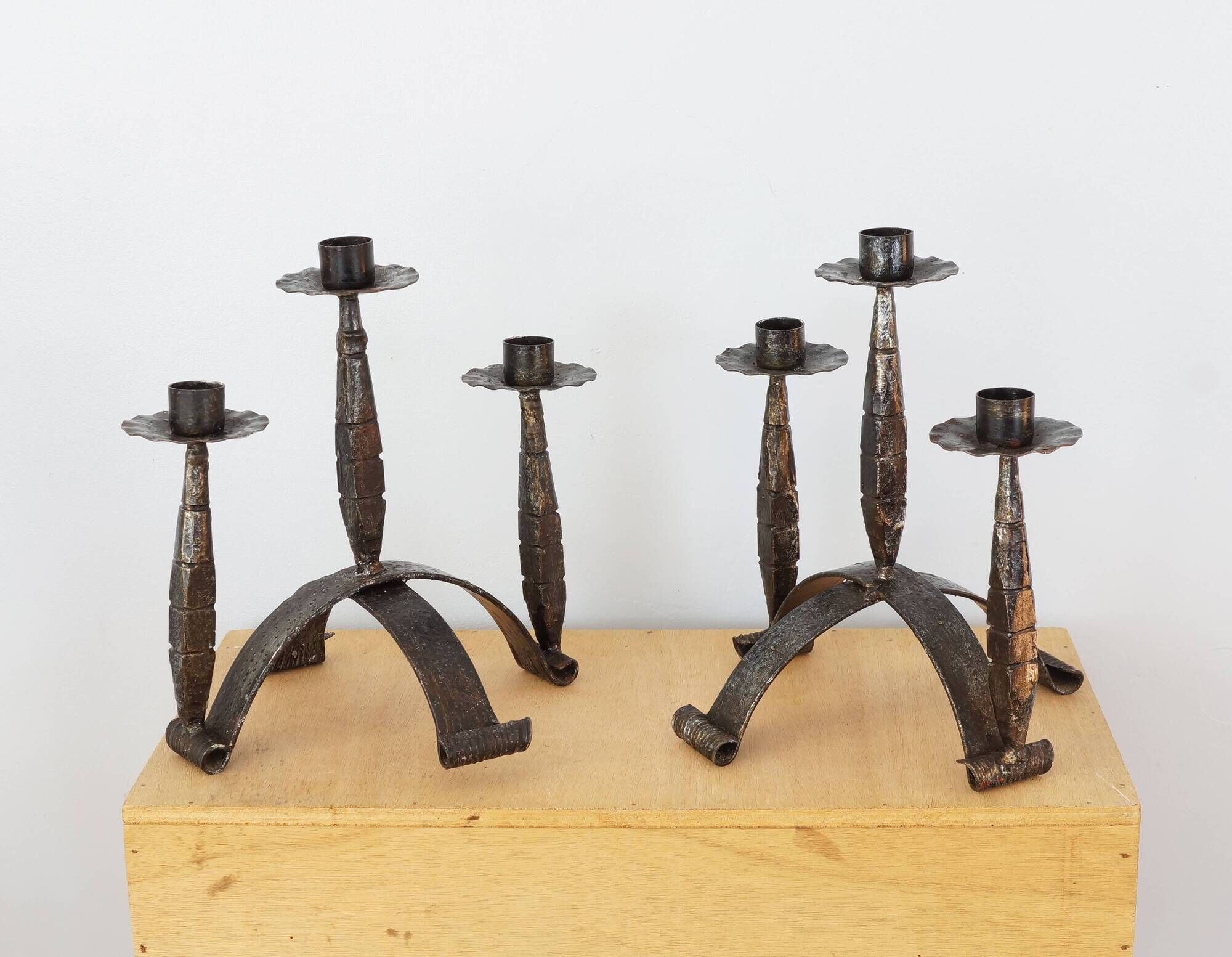 Pair of wrought iron candle holders, 60s