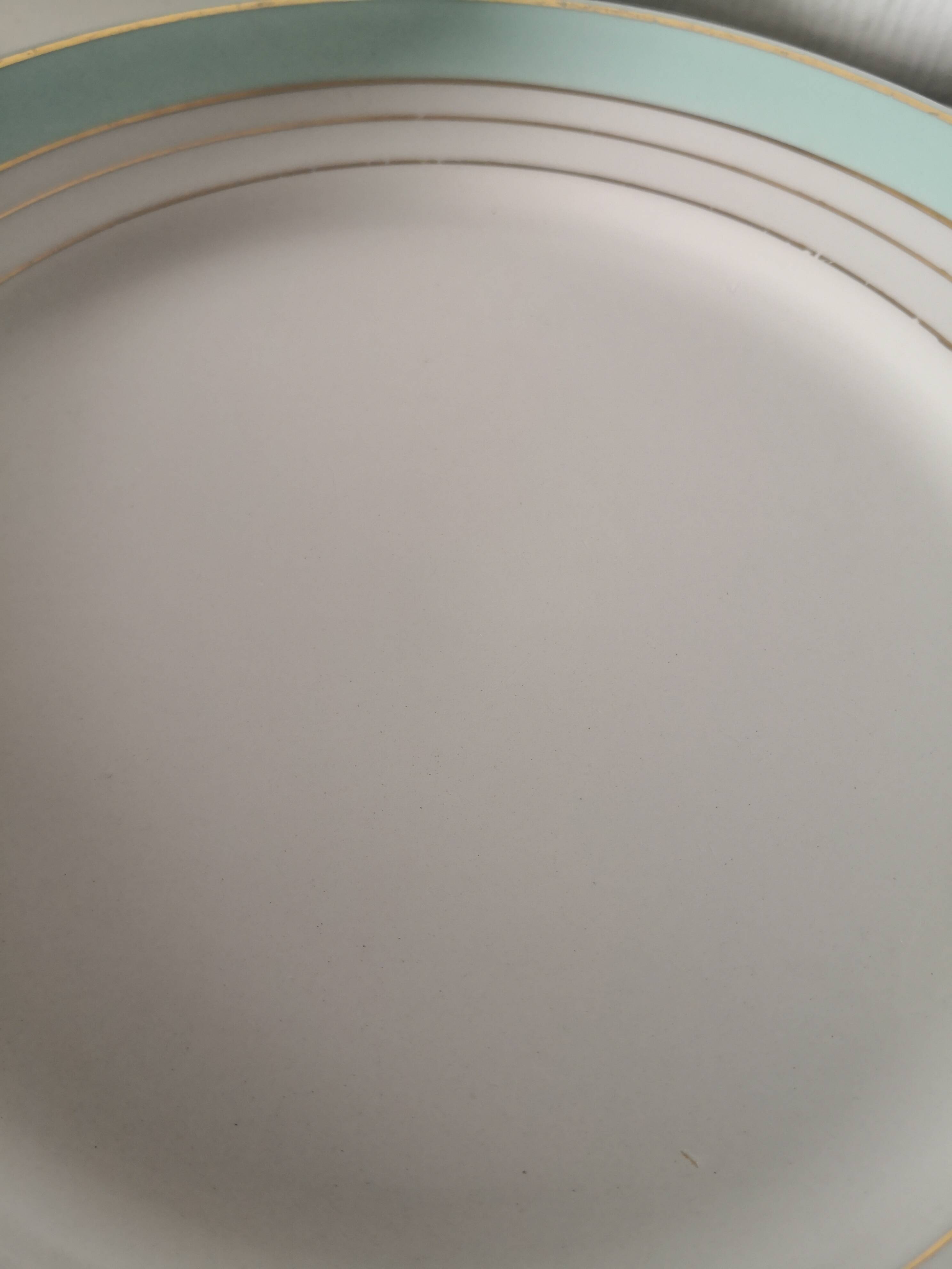 set of 9 green, white and gold Luneville plates