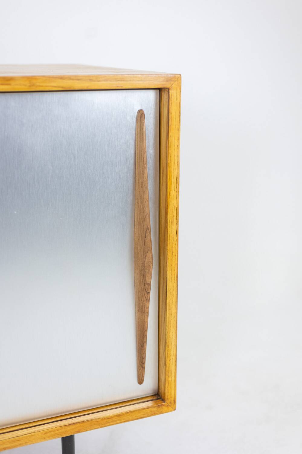 Low ash sideboard with sliding doors. 1960s.