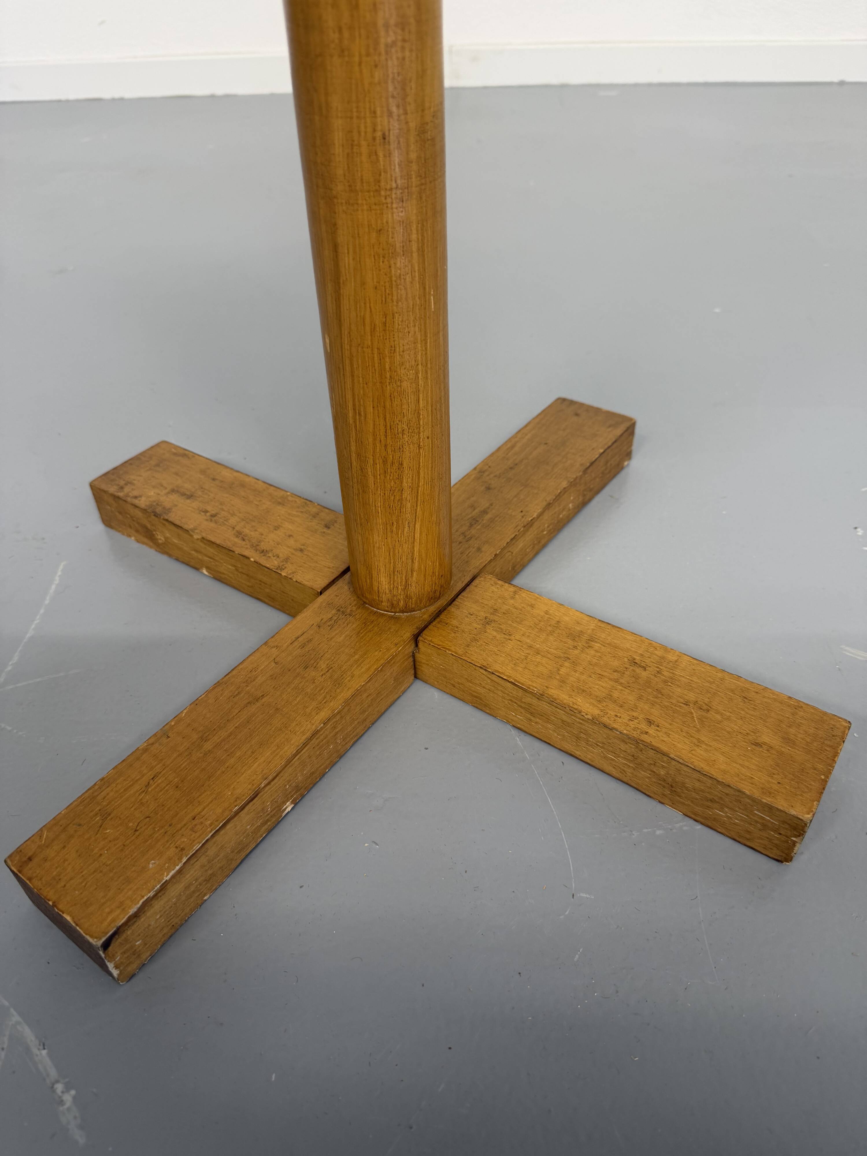 Vintage wooden coat stand with modernist design from the 1970s.