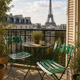 Pair of original patinated folding Parisian bistro chairs.