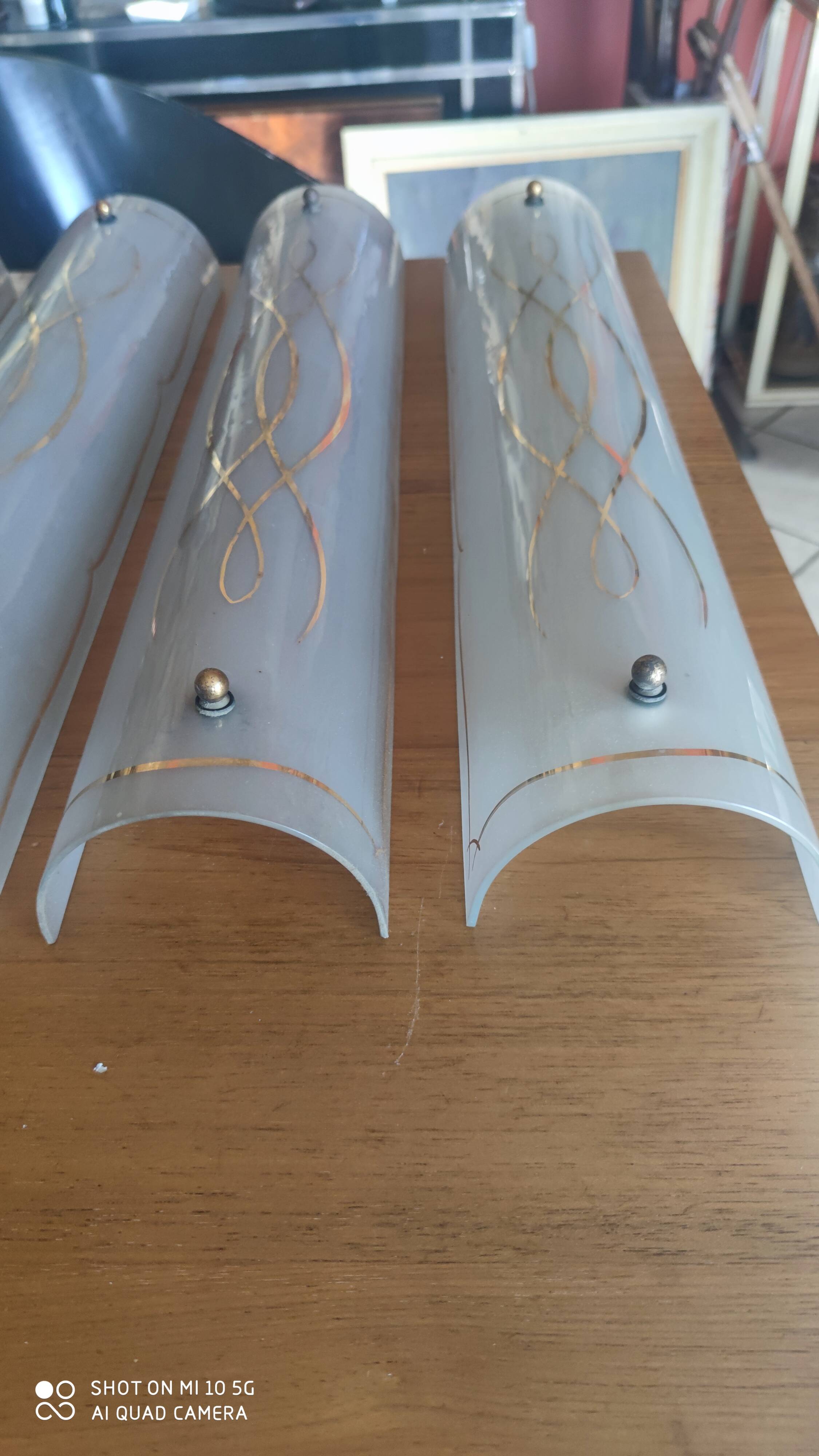 Set of 4 glass wall sconces circa 1940