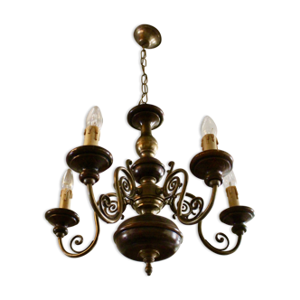 Old wooden and bronze chandelier