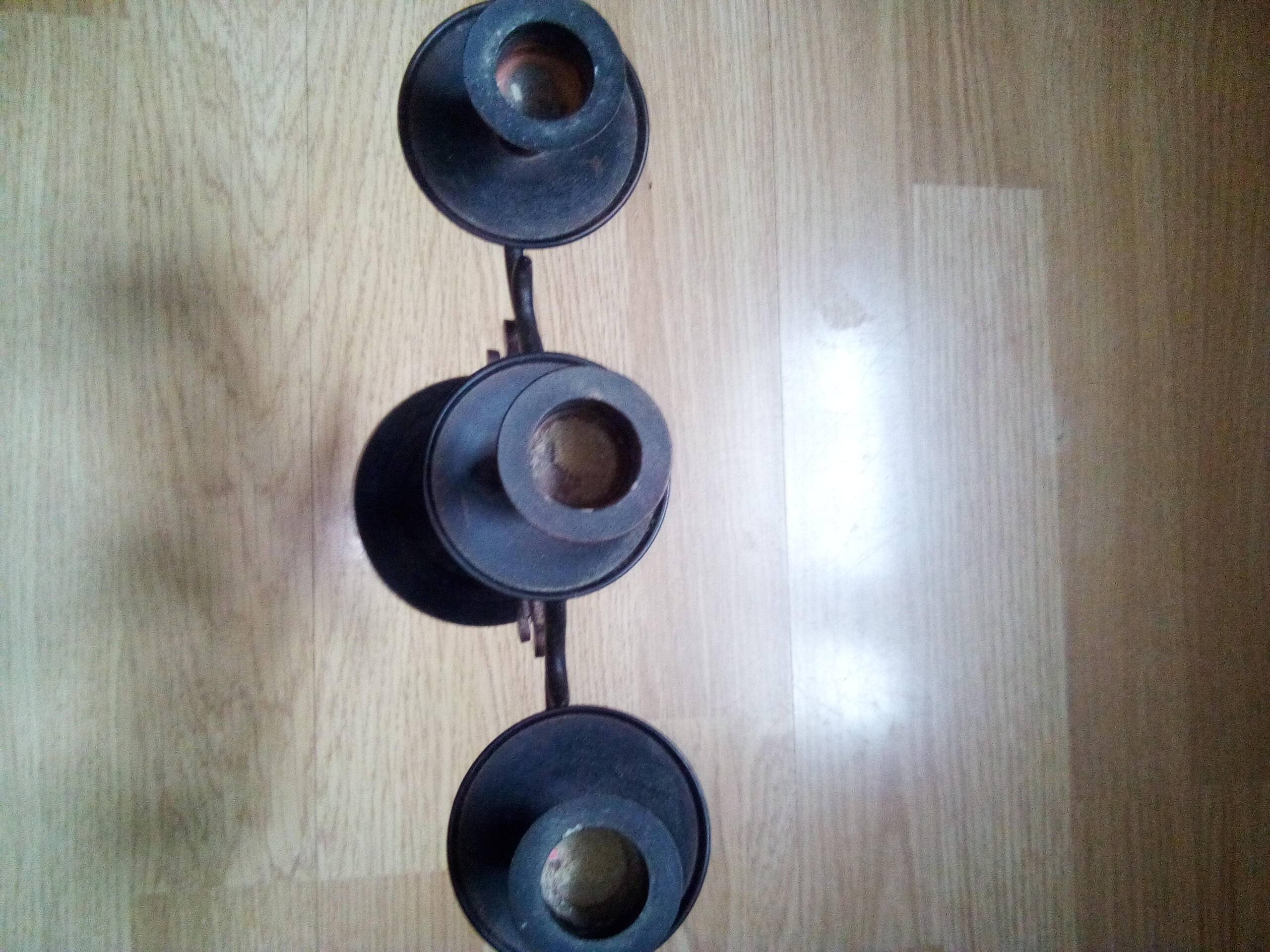 Three-branched black metal candelabra in gothic style