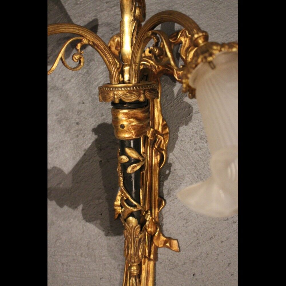 Series of four Louis XVI appliques