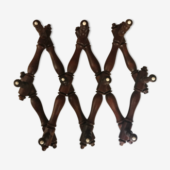 XIX stretchy wooden coat holder