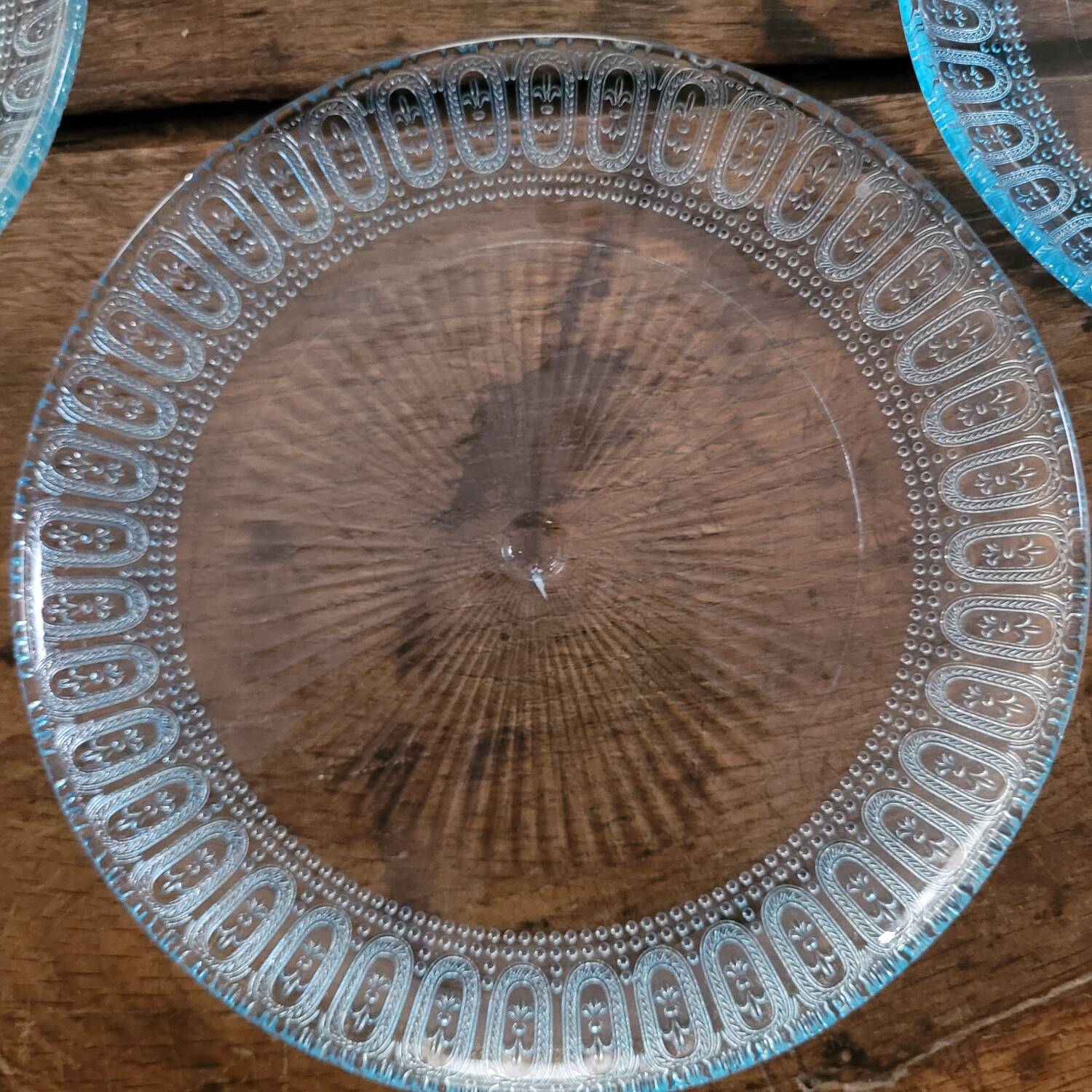 6 molded glass plates – 5 bluish, 1 aqua green