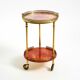 Round, small 1960s Aldo Tura serving or bar trolley in red goatskin leather