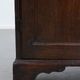 Charming and timeless antique English oak cabinet/commode from the early 19th century with two doors and a working lock
