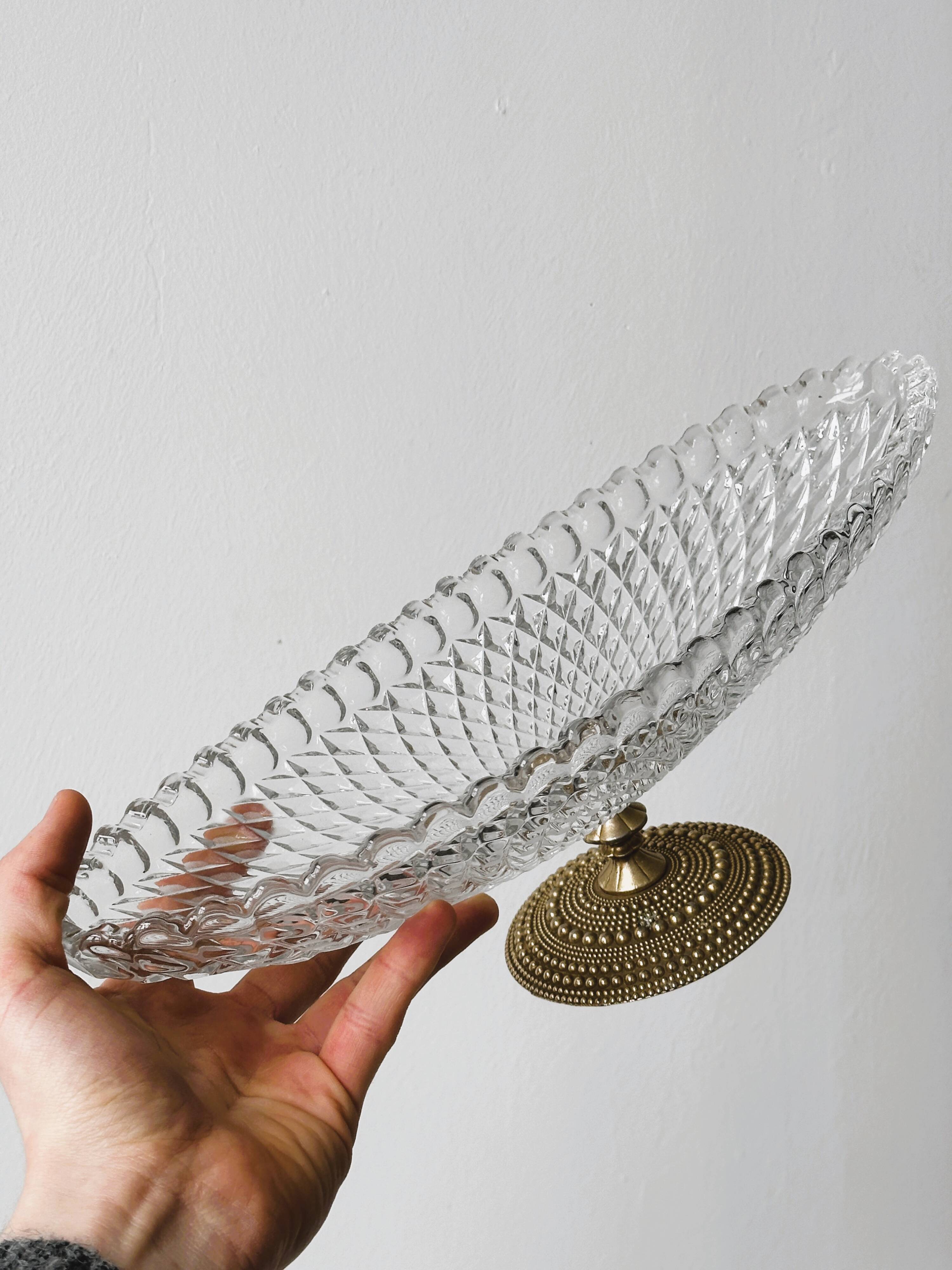 Molded glass bowl with gold metal base