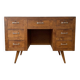 Vintage Scandinavian desk in waxed wood with 7 drawers.