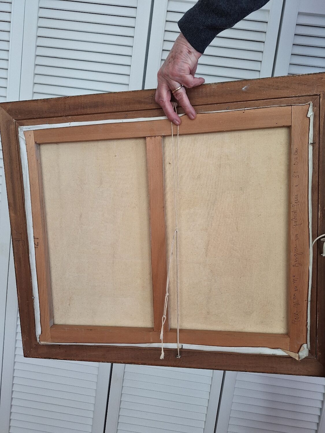 Oil painting depicting the Quai de Seine and booksellers.