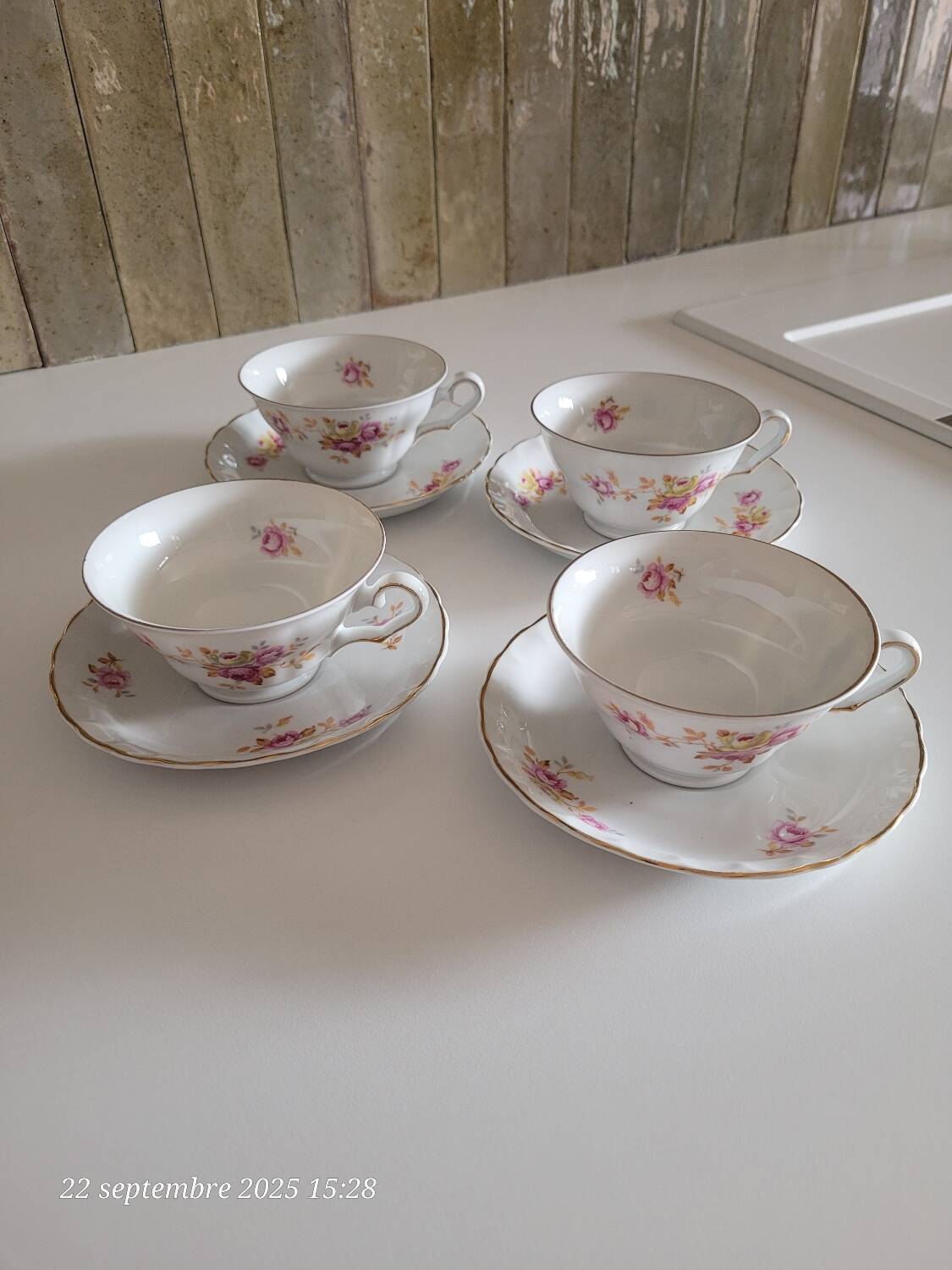 4 antique cups and saucers