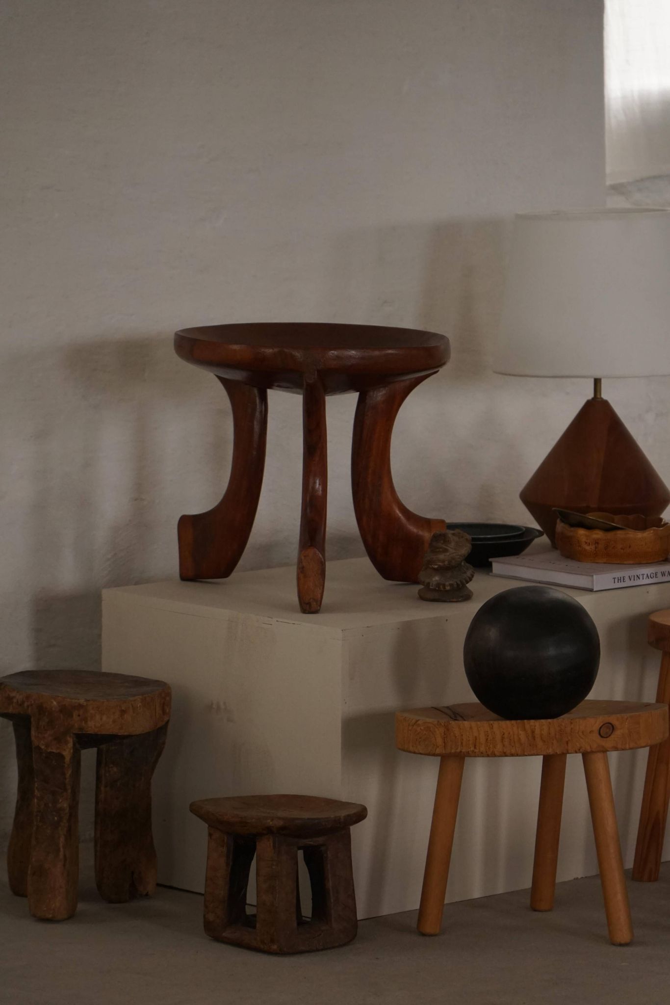 Oromo stool from mid-20th century Africa, hand-carved wood, tribal style.