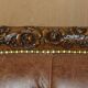 Chesterfield Regency 1810 antique canapé restored in leather with a carved frame.