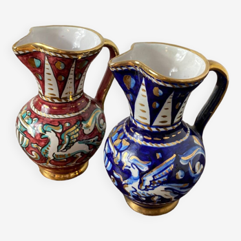 Old pinched pitchers in earthenware and slip