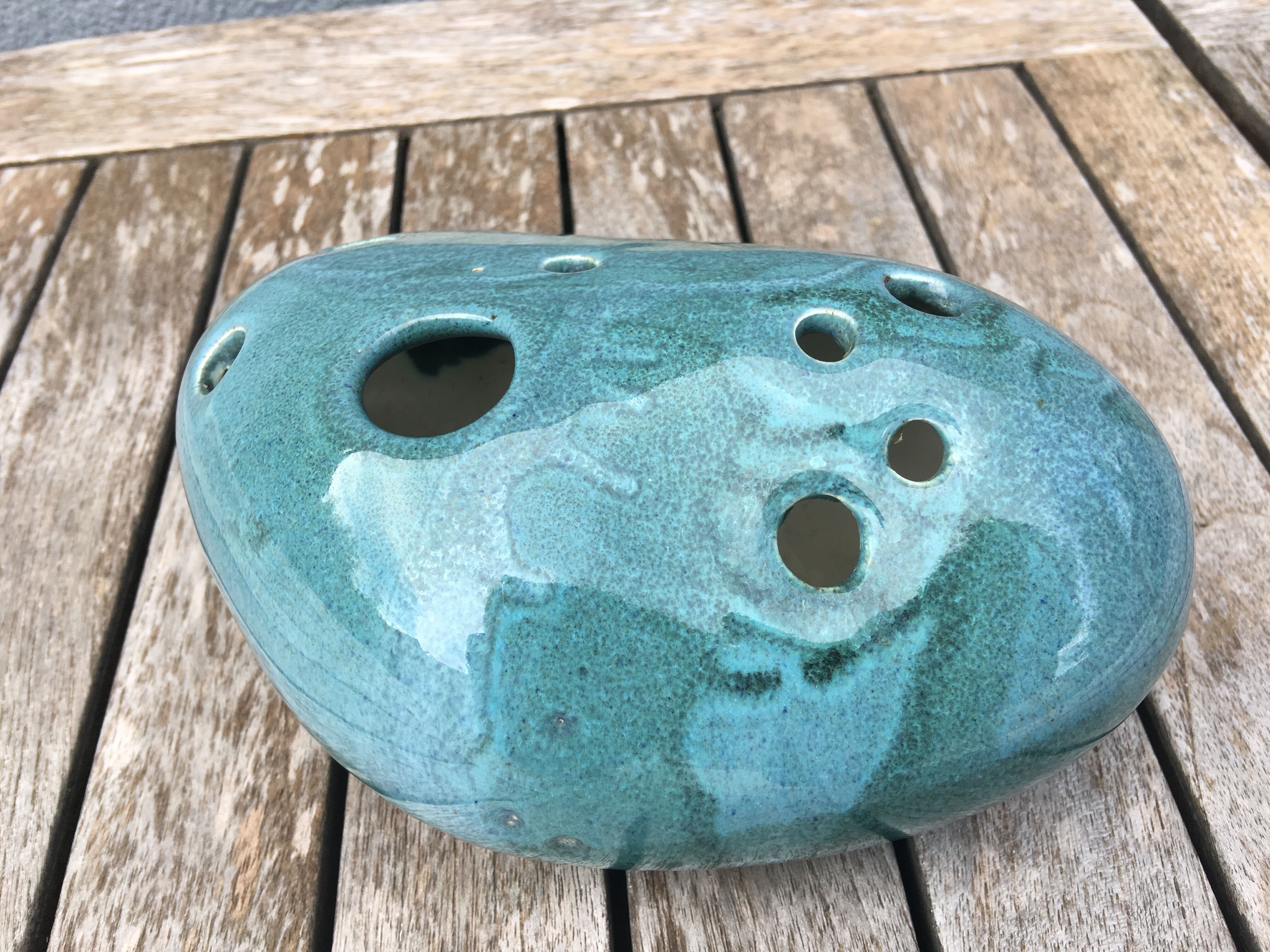 Roller spike flowers, blue-green ceramics