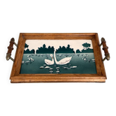 Service platter with a swan design.